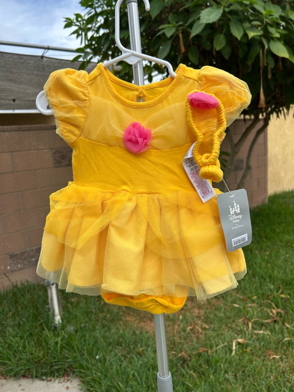 Disney store princess Belle Yellow Princess Tutu Bib with Pink Flower Accent